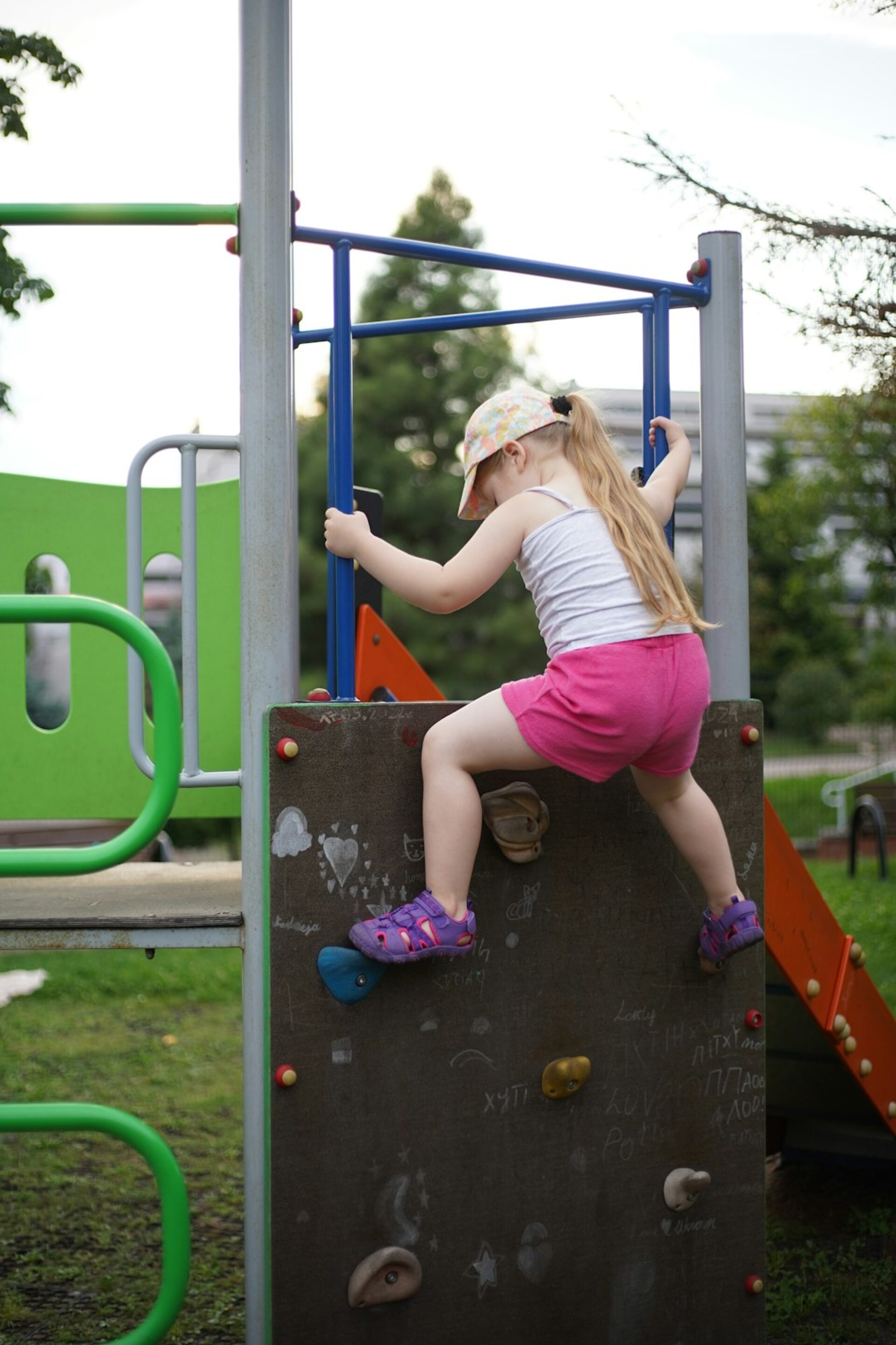 Child playing at a Hamlin Housing Authority community playground